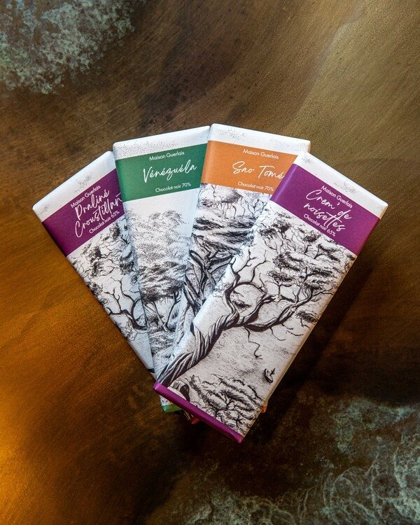 Photo de quatre tablettes de chocolat de la maison Guerlais